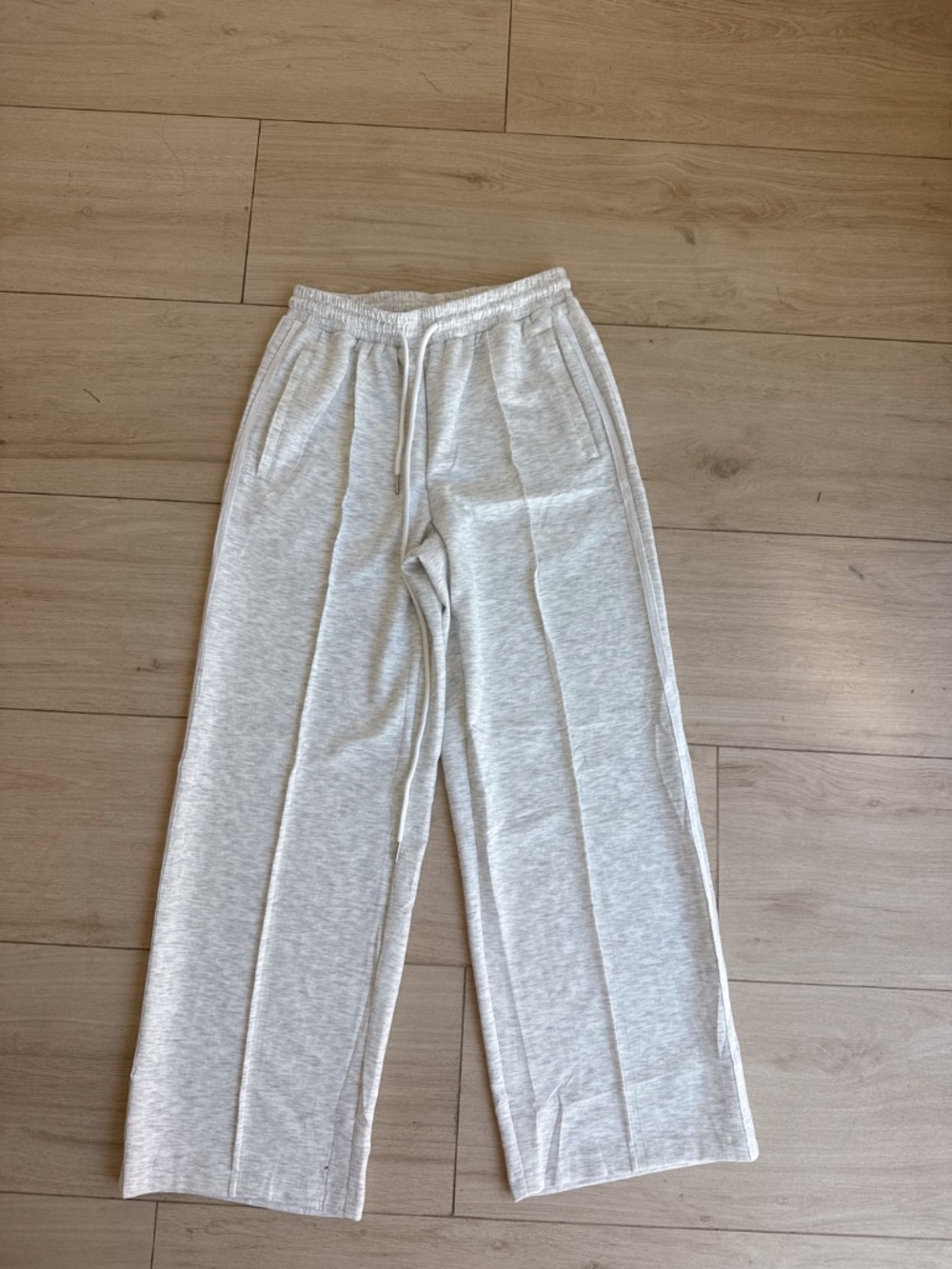 Light grey sweatpants with two white stripes on both sides - Women's S